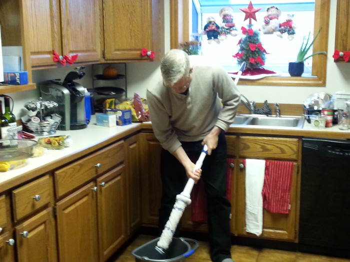 Mopping with Mr. Clean Mop