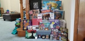 Games and swag I picked up at Gen Con 2018