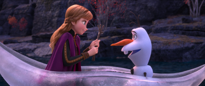 Anna and Olaf share an icy boat ride.